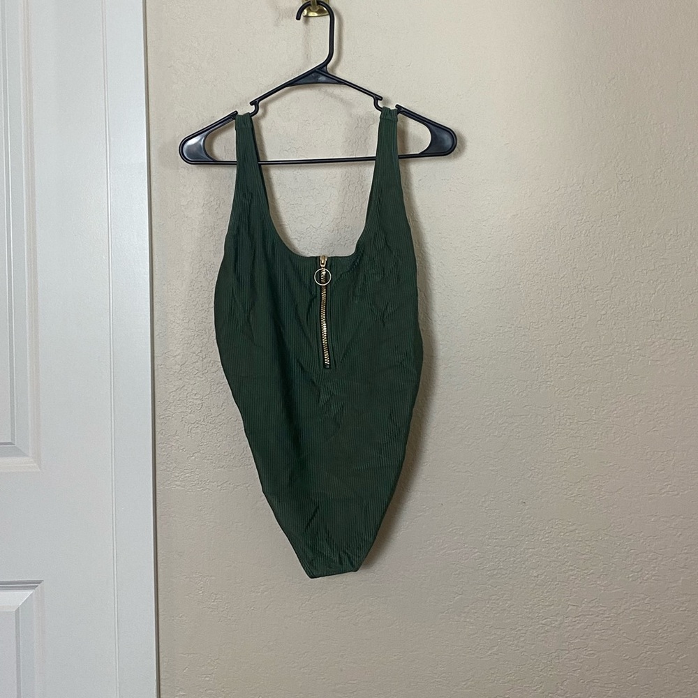 Green swimsuit never worn.